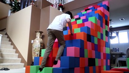 BUILDING A TOILET PAPER STAIRCASE!! (ATTEMPTING TO CLIMB UP)