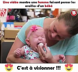Une vidéo montre une femme faisant percer les oreilles d'un bébé. C'est à visionner !!!