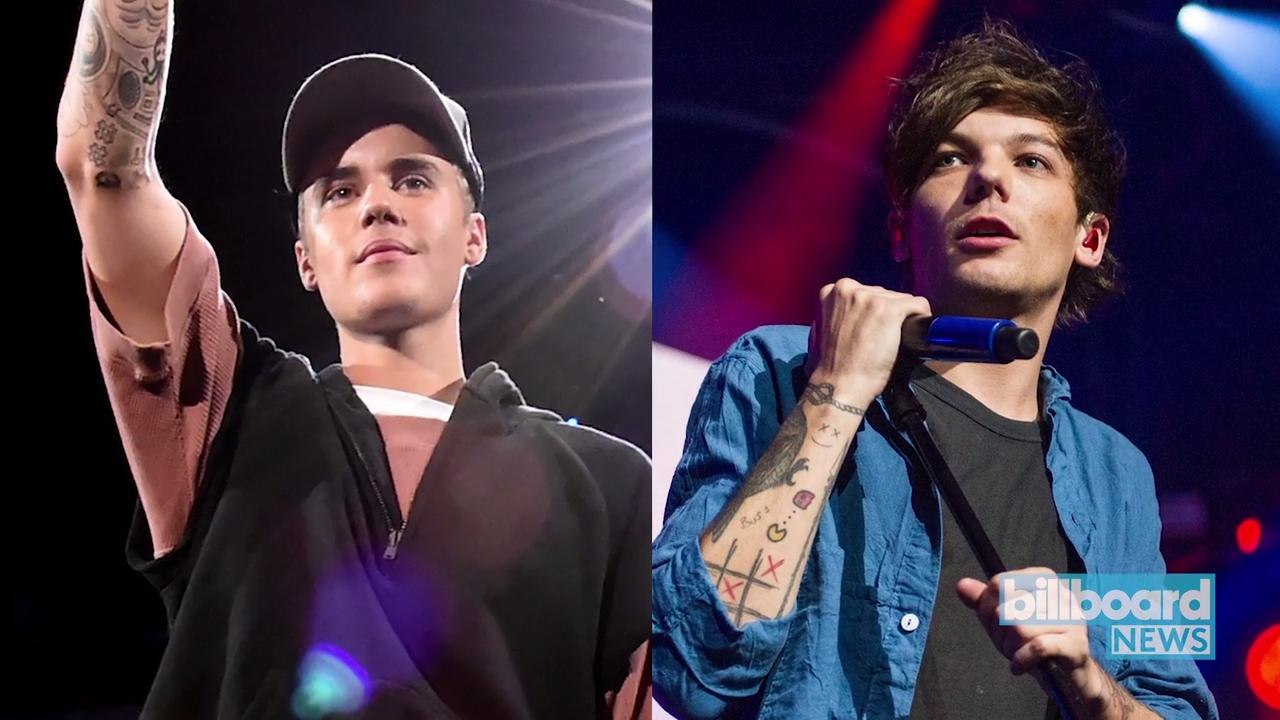 Fan Army Face-Off: Justin Bieber's Beliebers Battle Louis Tomlinson's Fans | Billboard News
