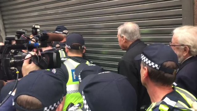Cardinal George Pell Navigates Media Scrum During Court Appearance