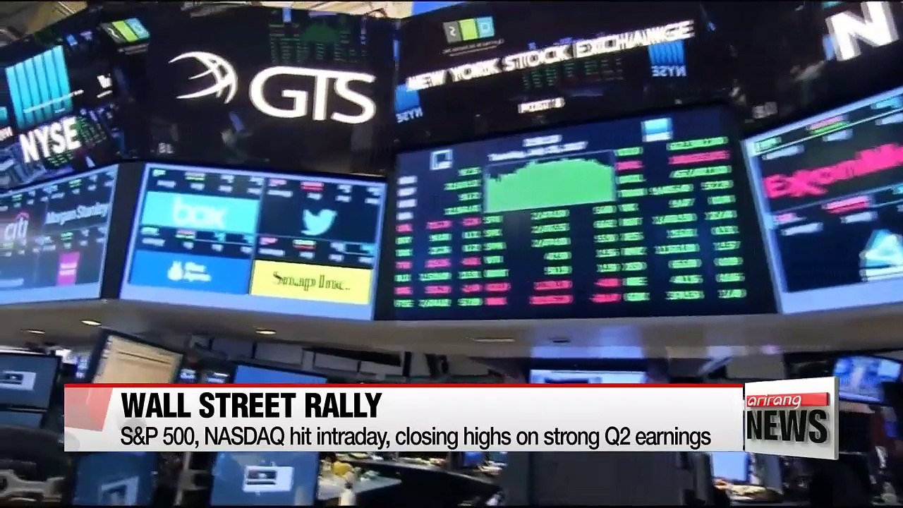 U.S. stocks close at record highs on strong corporate earnings