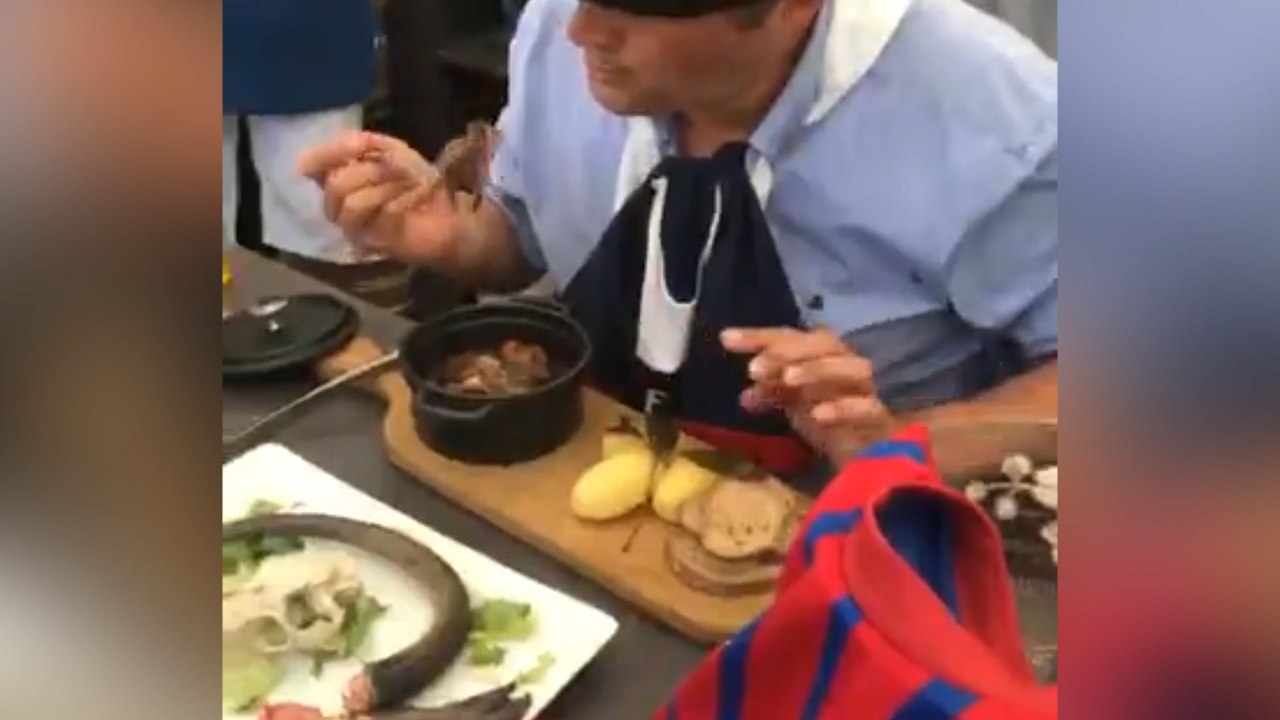 French mayor eats a rat after losing a soccer bet