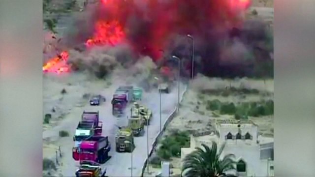 Egyptian tank runs over suicide bomber's car before it explodes
