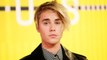 Justin Bieber strikes paparazzo with pickup in Beverly Hills