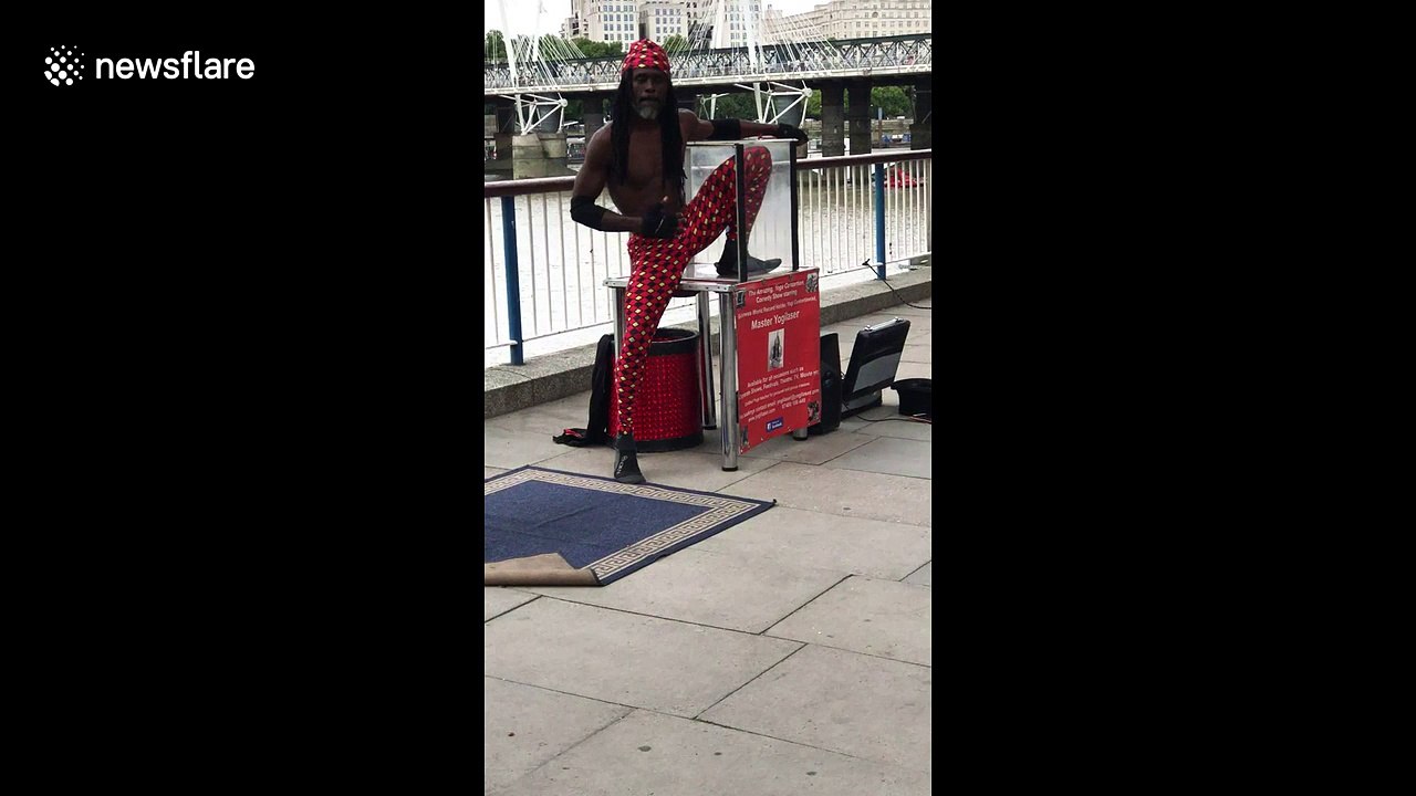 Contortionist squeezes himself into tiny box