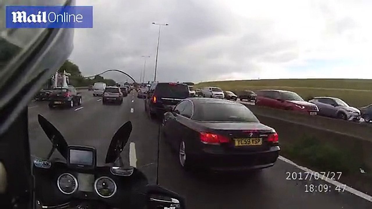 Biker compiles video footage of drivers on their phones