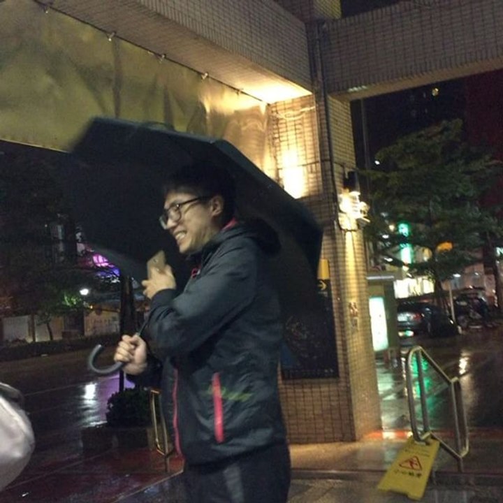 Civilians Take Refuge From Typhoon Nesat Winds Near Taipei MRT Entrance