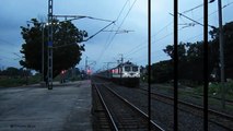 Raw Power GZB WAP-7 Sealdah Rajdhani speeds under monsoon clouds !!!!