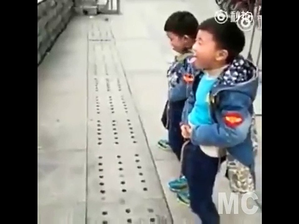 Funny , What is boy doing?
