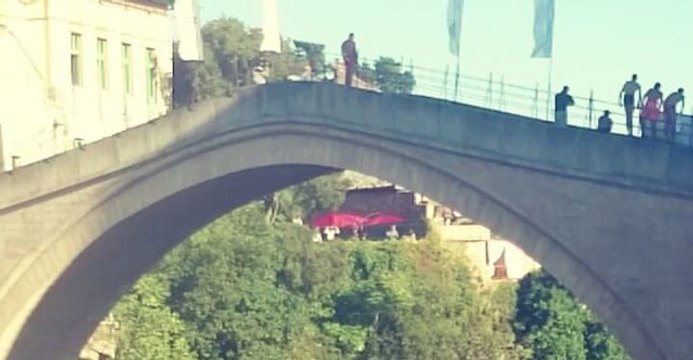 Participants Jump Off Mostar Old Bridge During 451st Diving Competition