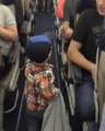 Fist-Bumping 2-Year-Old Boards Airplane in Style, Wins Hearts of Other Passengers