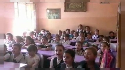 عودة الأطفال إلى المدارس في الموصل رغم حرارة الصيف