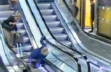This Is Why You Should Never Take Luggage On To An Escalator