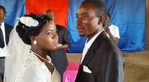 Man at urges kisses his wife even almost  passionately like in the bedroom