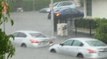 Cars 'Float' Along Flooded South Beach Streets in Miami