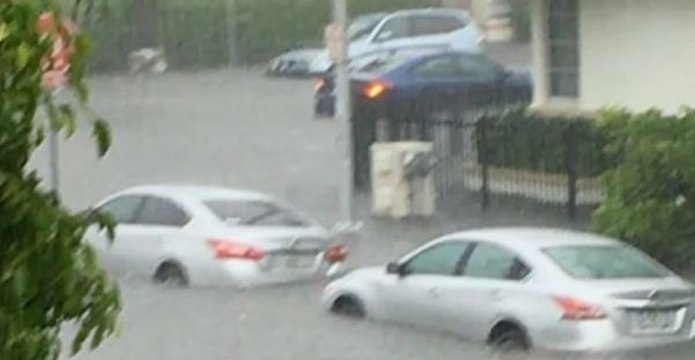 Cars 'Float' Along Flooded South Beach Streets in Miami