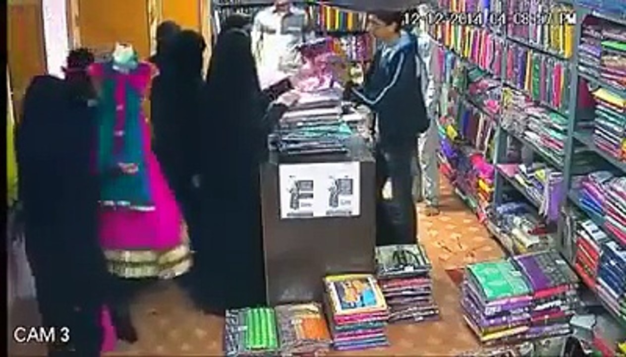 A_GIRL_STOLE_THE_DRESS_INTO_THE_SHOP