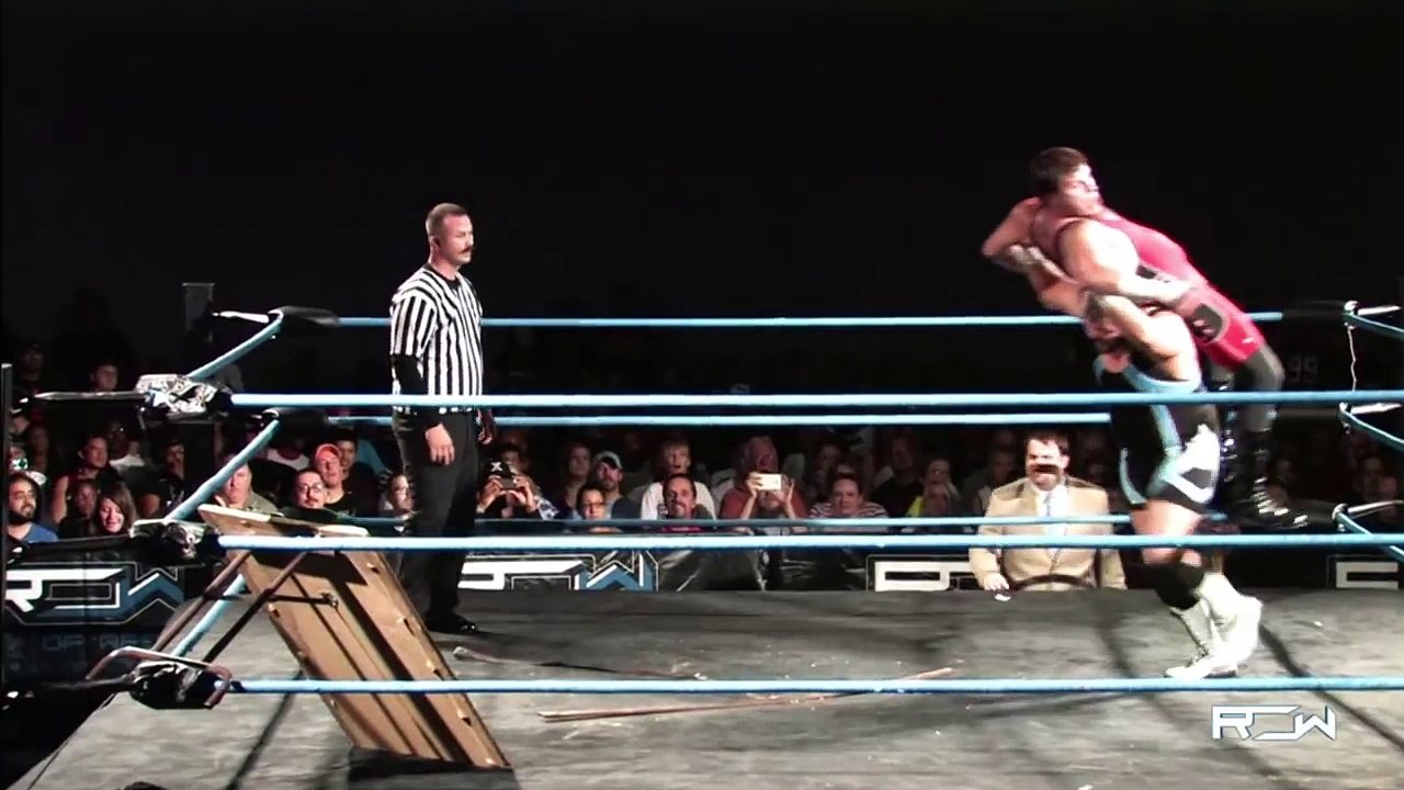Reality of Wrestling "QUICK CLIP" - Powerbomb Through a Table
