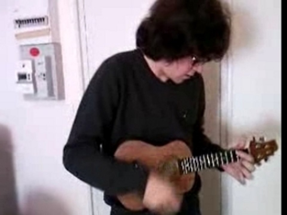 Thomas is playing uKuLeLe
