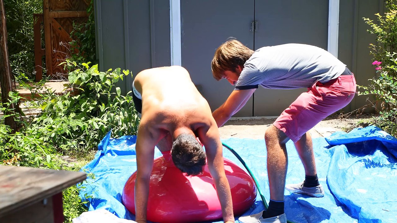 6ft Man in 6ft Giant Water Balloon - 4K - The Slow Mo Guys