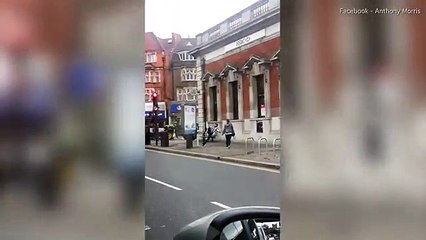 London man in 1970s flares performs bizarre leg kicks