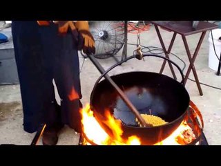 Husband and Wife Broil Kettle-Cooked Popcorn