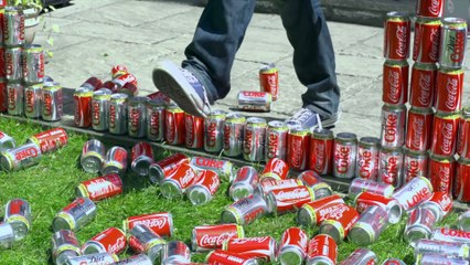 Crashing through 200 Coke Cans - The Slow Mo Guys