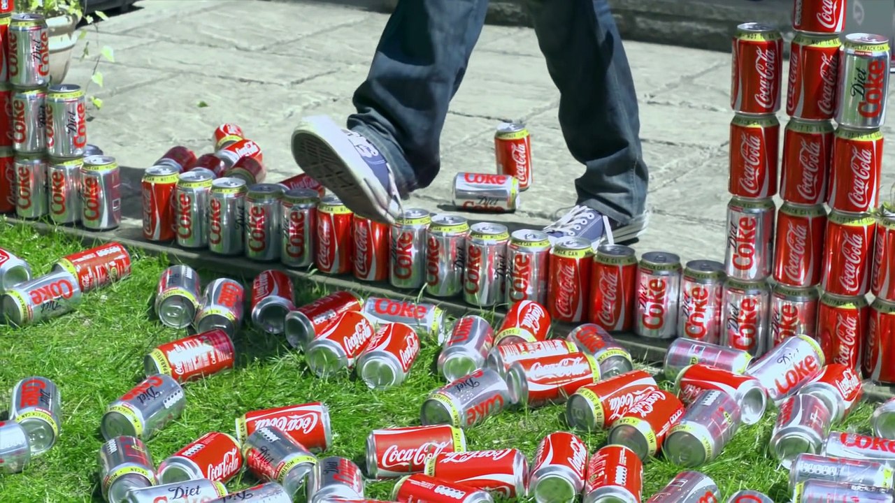 Crashing through 200 Coke Cans - The Slow Mo Guys