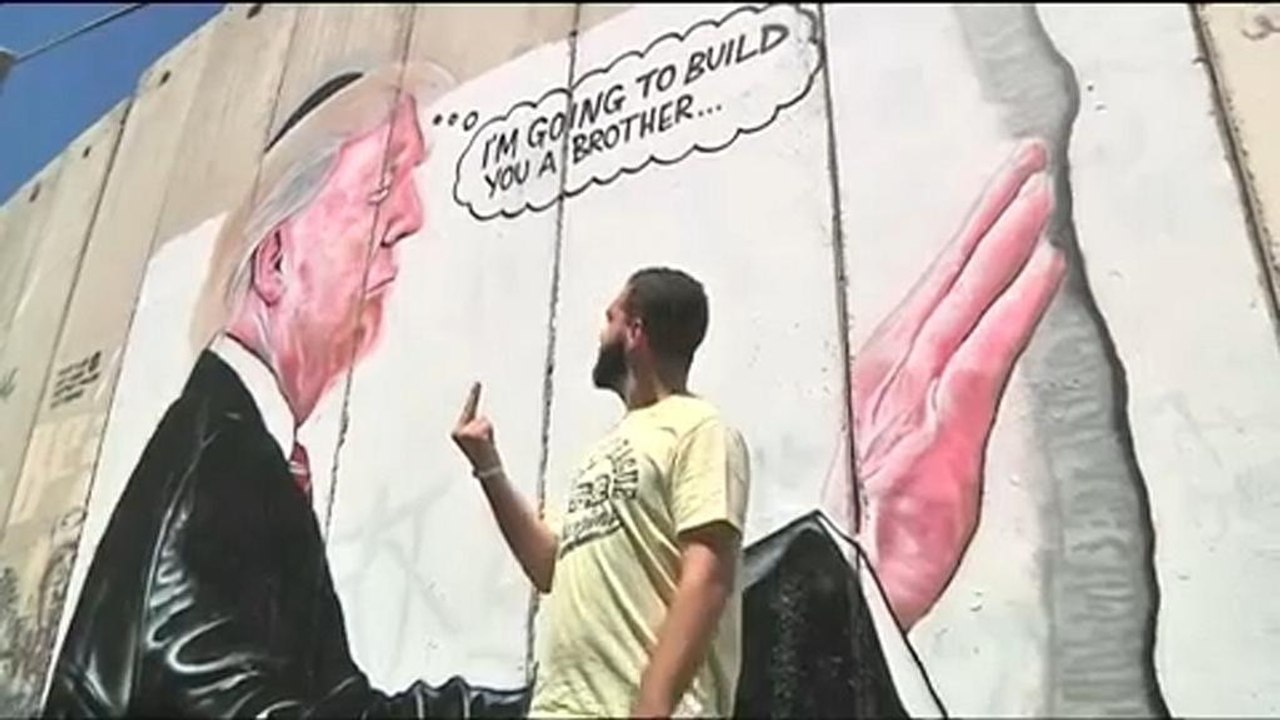 Trump-Karikatur im Westjordanland: ein Herz für Mauern