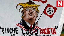 Trump's immigration policies inspire graffiti around the world