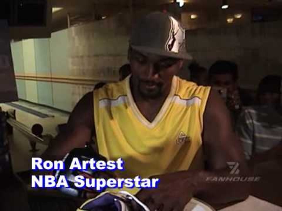 Lakers Star Ron Artest picks a fan as a sidekick