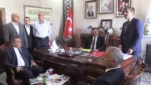 Orman ve Su İşleri Bakanı Eroğlu, Belediye Ziyaretinde Bulundu