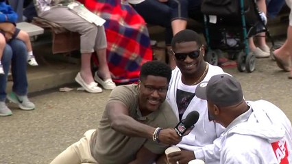 Burleson jumps on a car to interview LaDainian Tomlinson