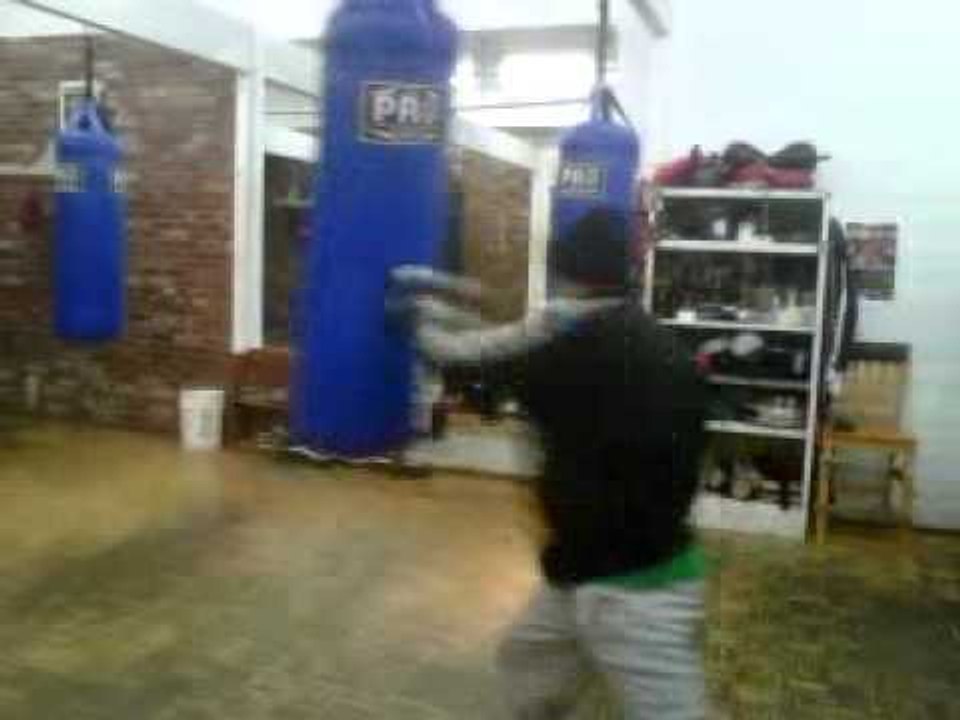 Working the heavybag at the goossen's gym van n...