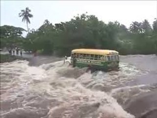 BUS & PASSENGERS WASHED AWAY IN FLOODING RIVER