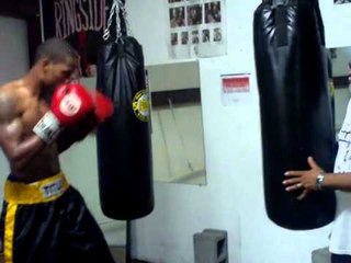 Boxing Star Lamar Russ Working The Heavybag
