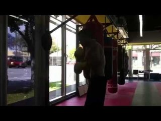 Boxer Vanes Martirosyan working the heavybag