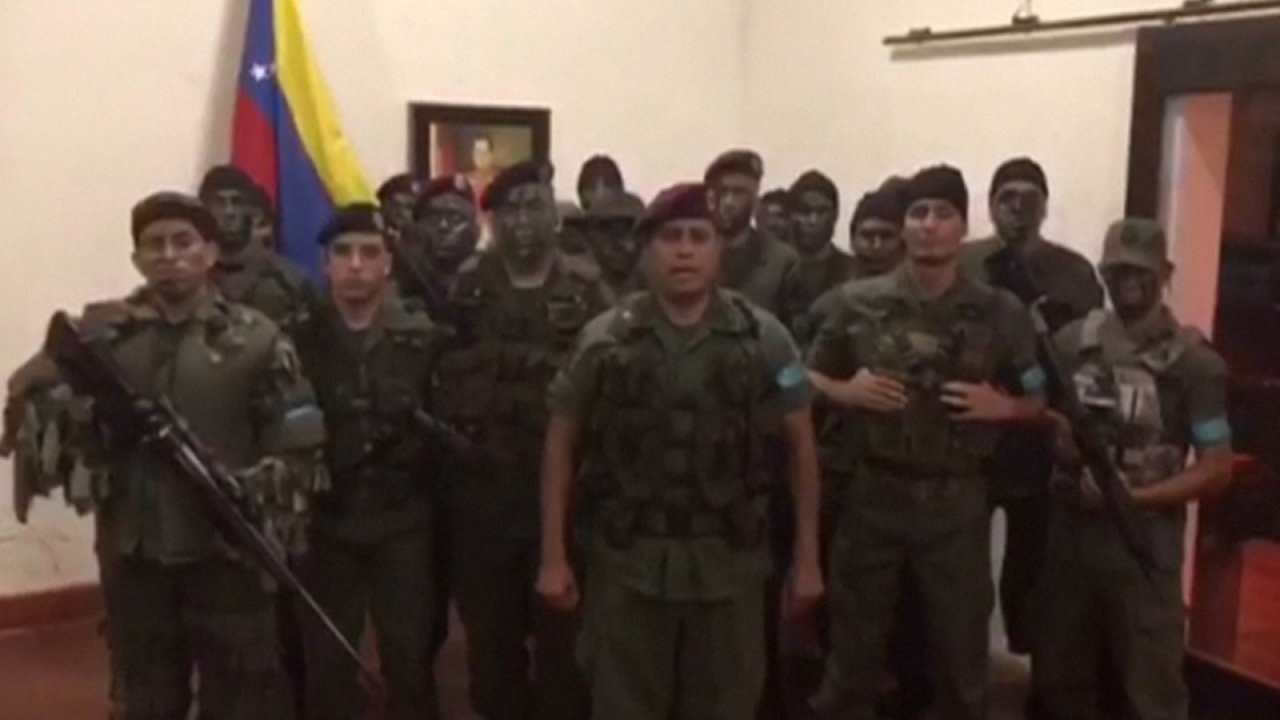 Reports of attack on Venezuelan military fort as armed men call for uprising