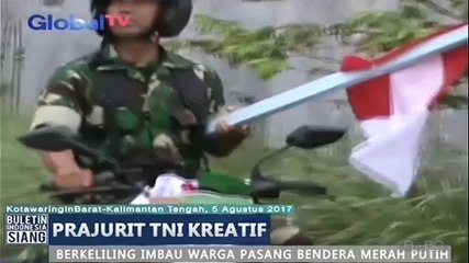 Prajurit TNI Ajak Warga Pasang Bendera Merah Putih di Kalimantan Tengah