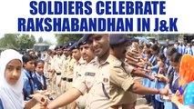 Rakshabandhan celebrations: School girls tie rakhi to jawans in J&K | Oneindia News