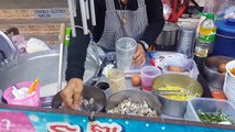 Thailand Street Food Khao Tom (Rice Soup With Pork And Egg)