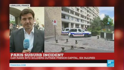 Car rams into soldiers in Paris