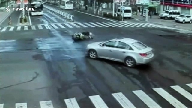 Motorcyclist crashes and slides 20 metres on road