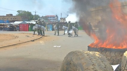 Kenya election: Police fire tear gas as angry voters light tires in the streets