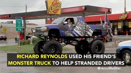 Monster truck tows motorists stranded in Houston flooding