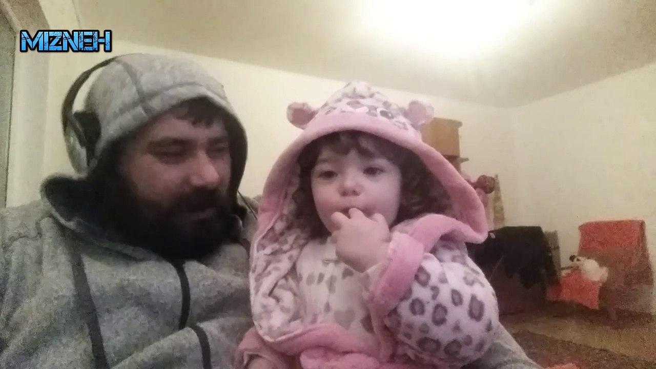 Baby eating nuts and saying hi to her fans