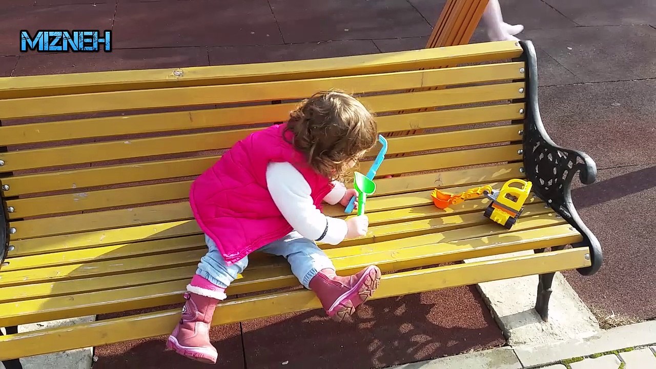Baby stealing her friend's toys