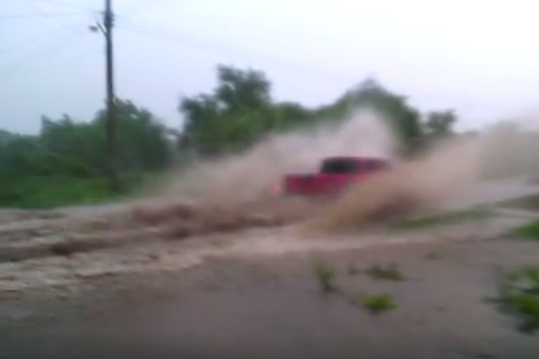 Floodwaters Swamp Roads and Homes in Mexico's Sinaloa State