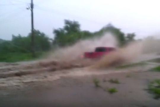 Floodwaters Swamp Roads and Homes in Mexico's Sinaloa State