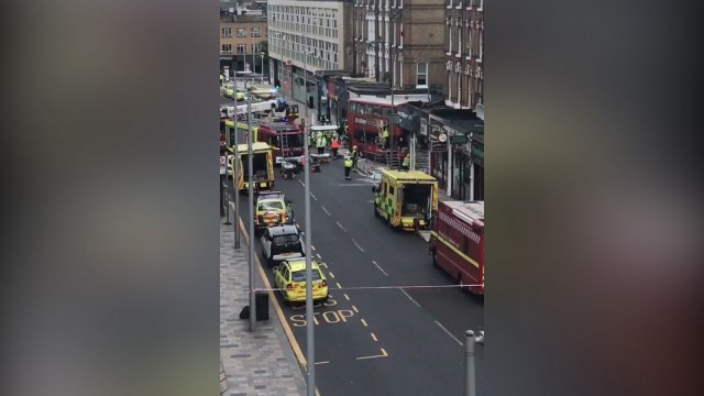 London bus crashes into shopfront